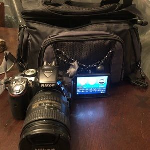 Nikon D5300 with DX lens and bag.